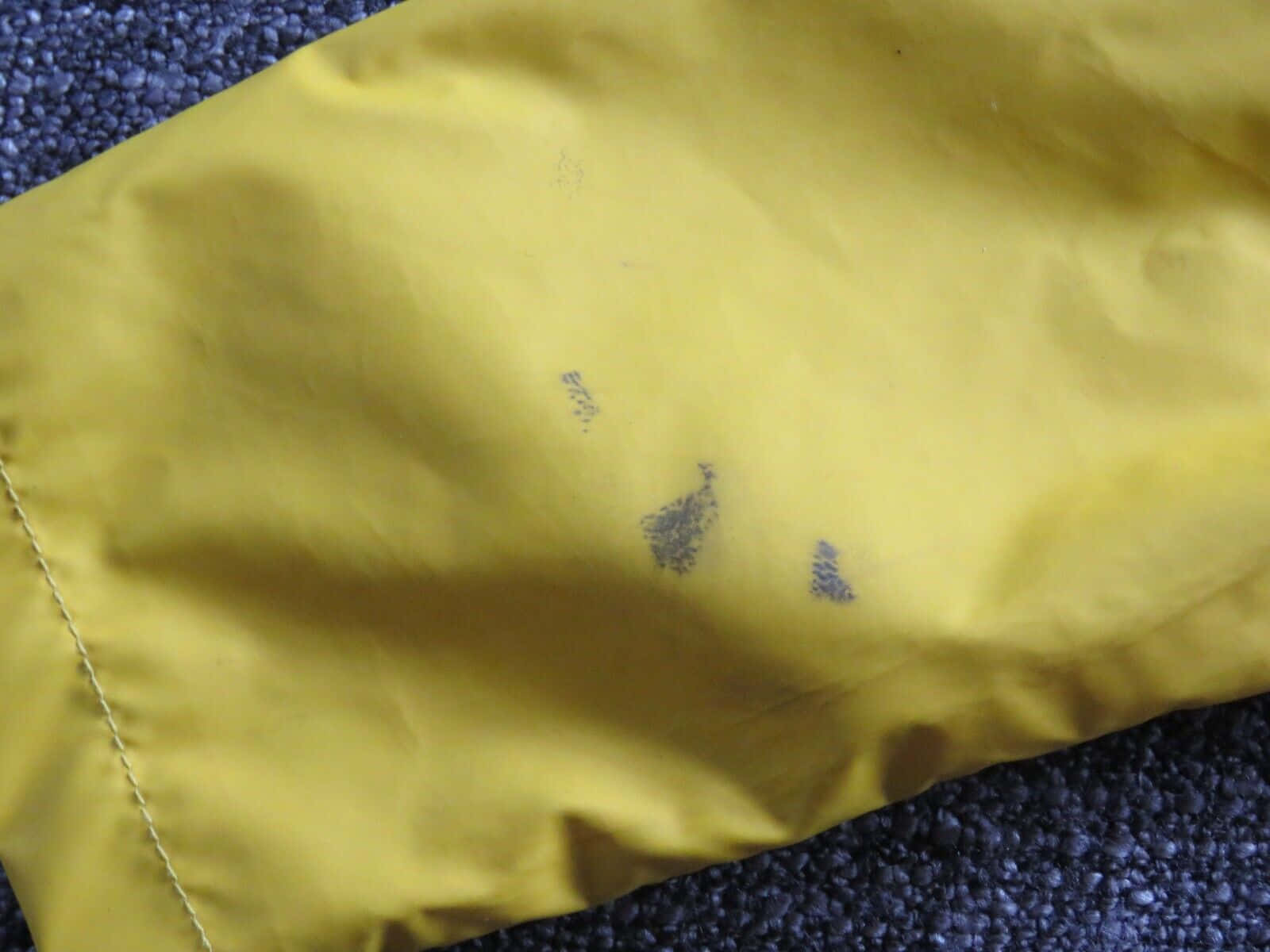 vibrant yellow raincoat, yellow fabric, dark stains, HD Desktop Wallpaper