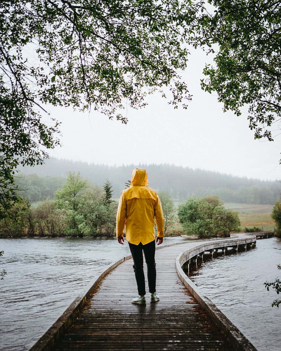 Yellow Raincoat, bright yellow raincoat, wooden bridge, SD Phone Wallpaper