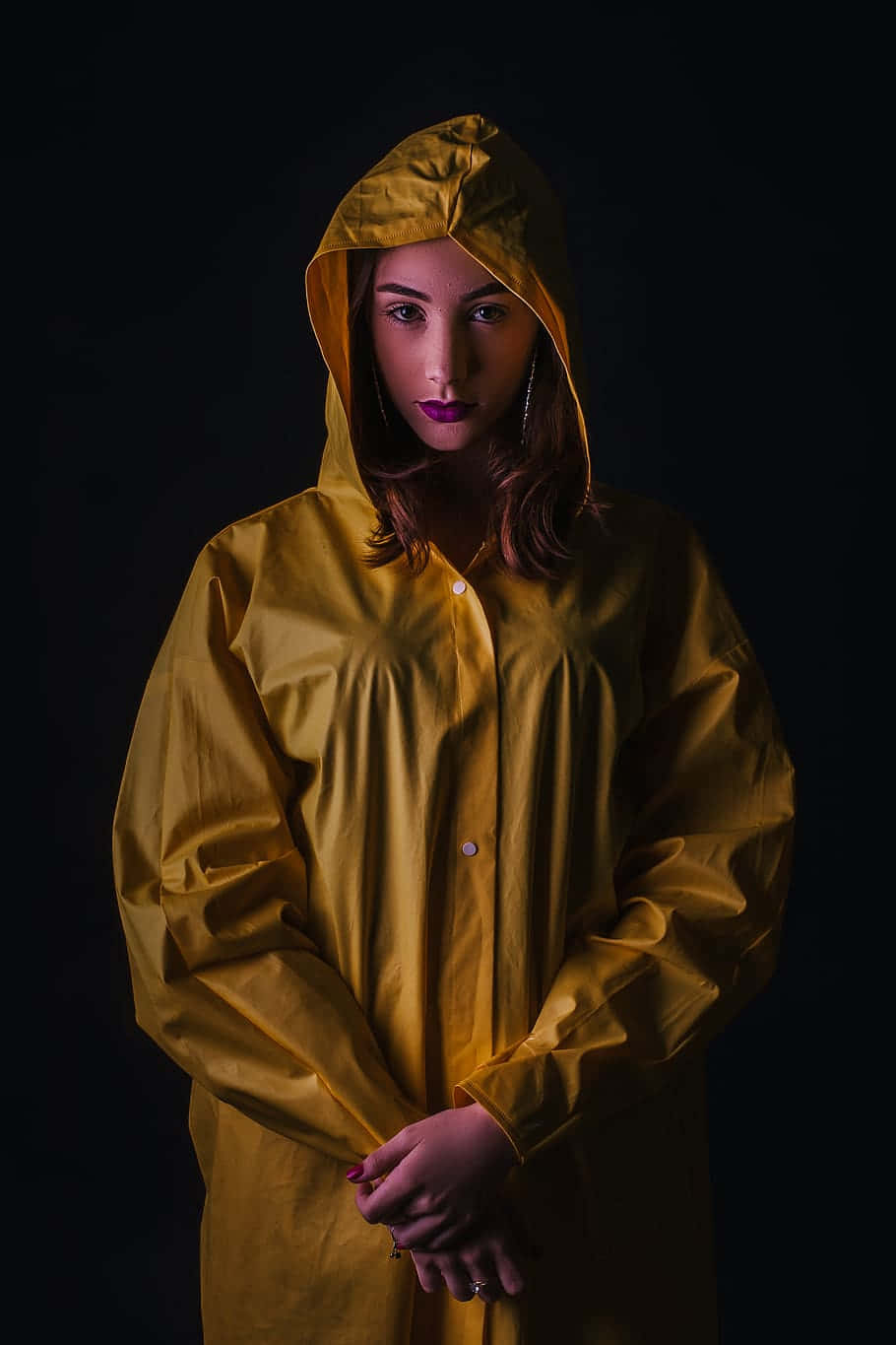 mustard yellow raincoat, black background, purple lipstick, HD Phone Wallpaper
