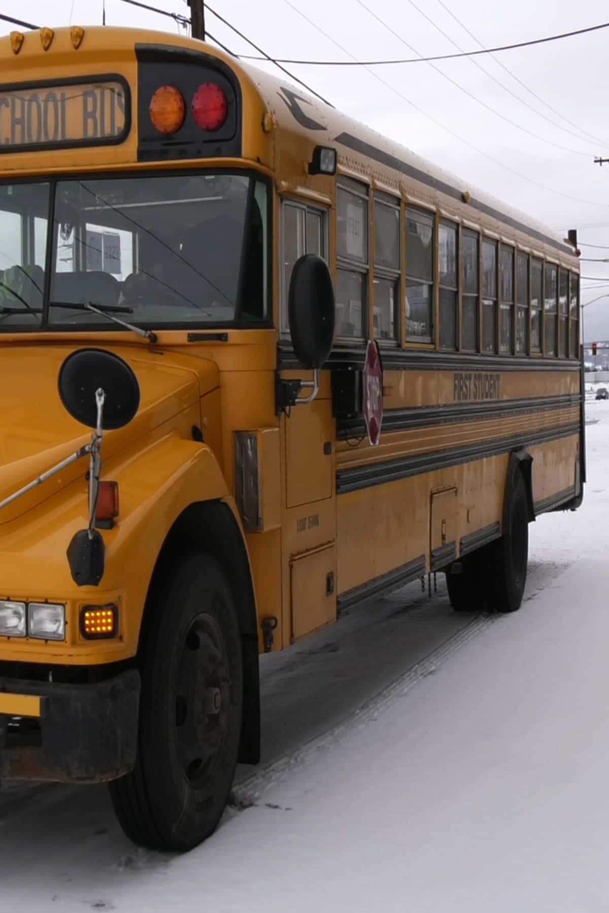 Yellow School Bus, snowy lot, overcast sky, HD Phone Wallpaper