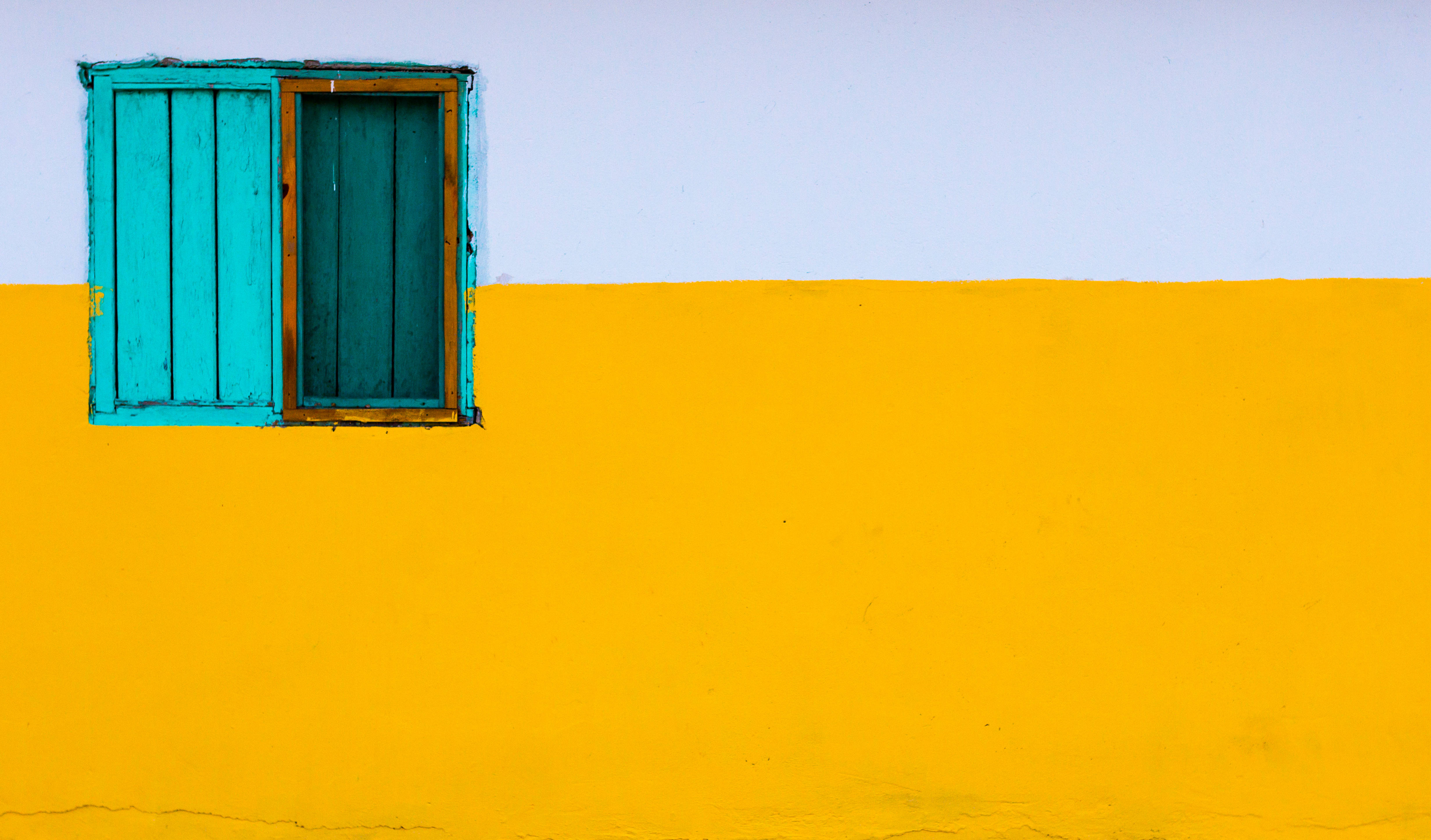 yellow wall, teal window, pale blue sky, 4K Desktop Wallpaper