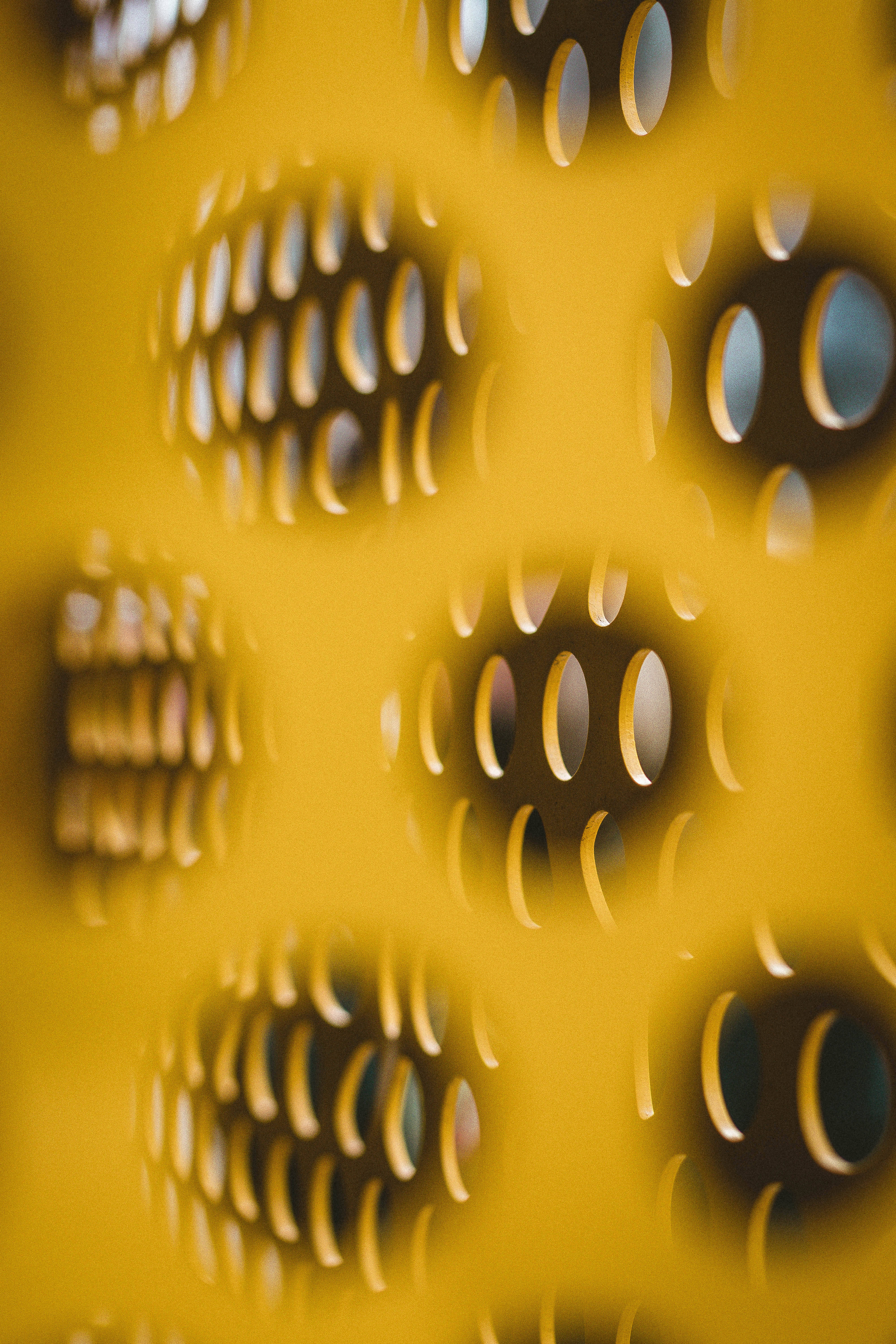 metal grill, brown and yellow texture, vibrant yellow perforated metal surface, 5K Phone Wallpaper