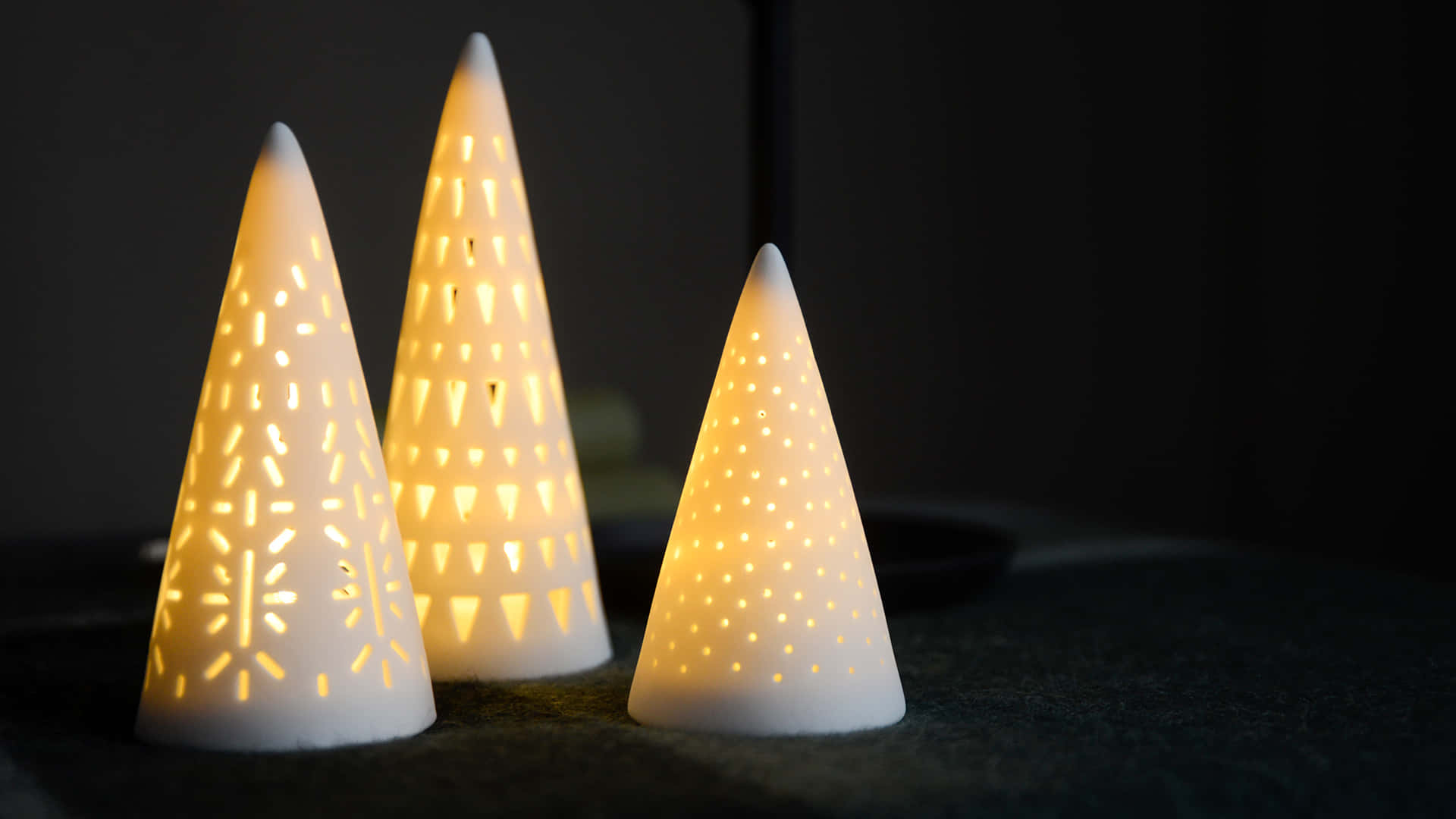 Yellow Triangle, glowing white cone-shaped lanterns, intricate cutout patterns, Full HD Desktop Wallpaper