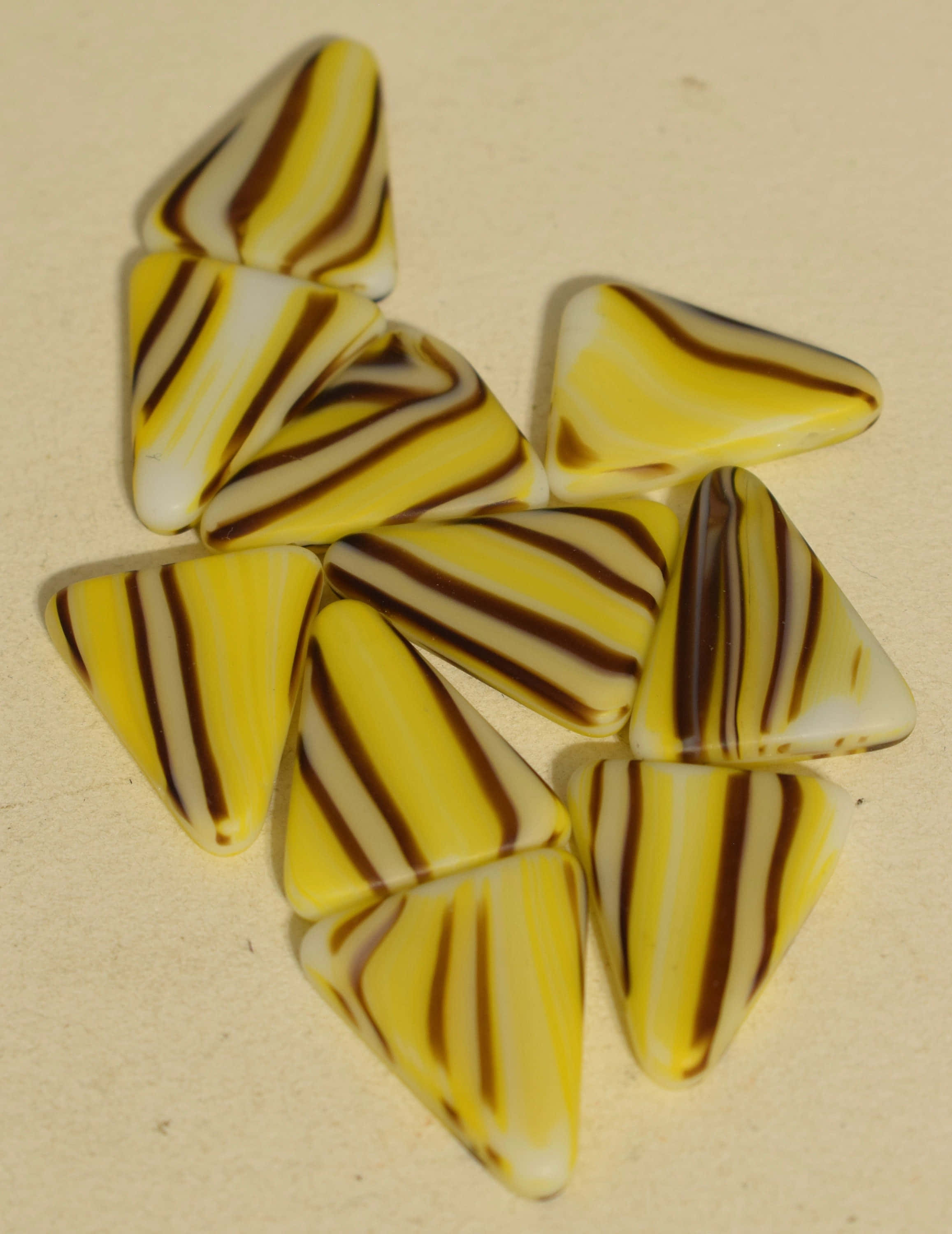 yellow triangle, glossy triangular glass beads, bold yellow brown and white stripes, 2K Phone Wallpaper
