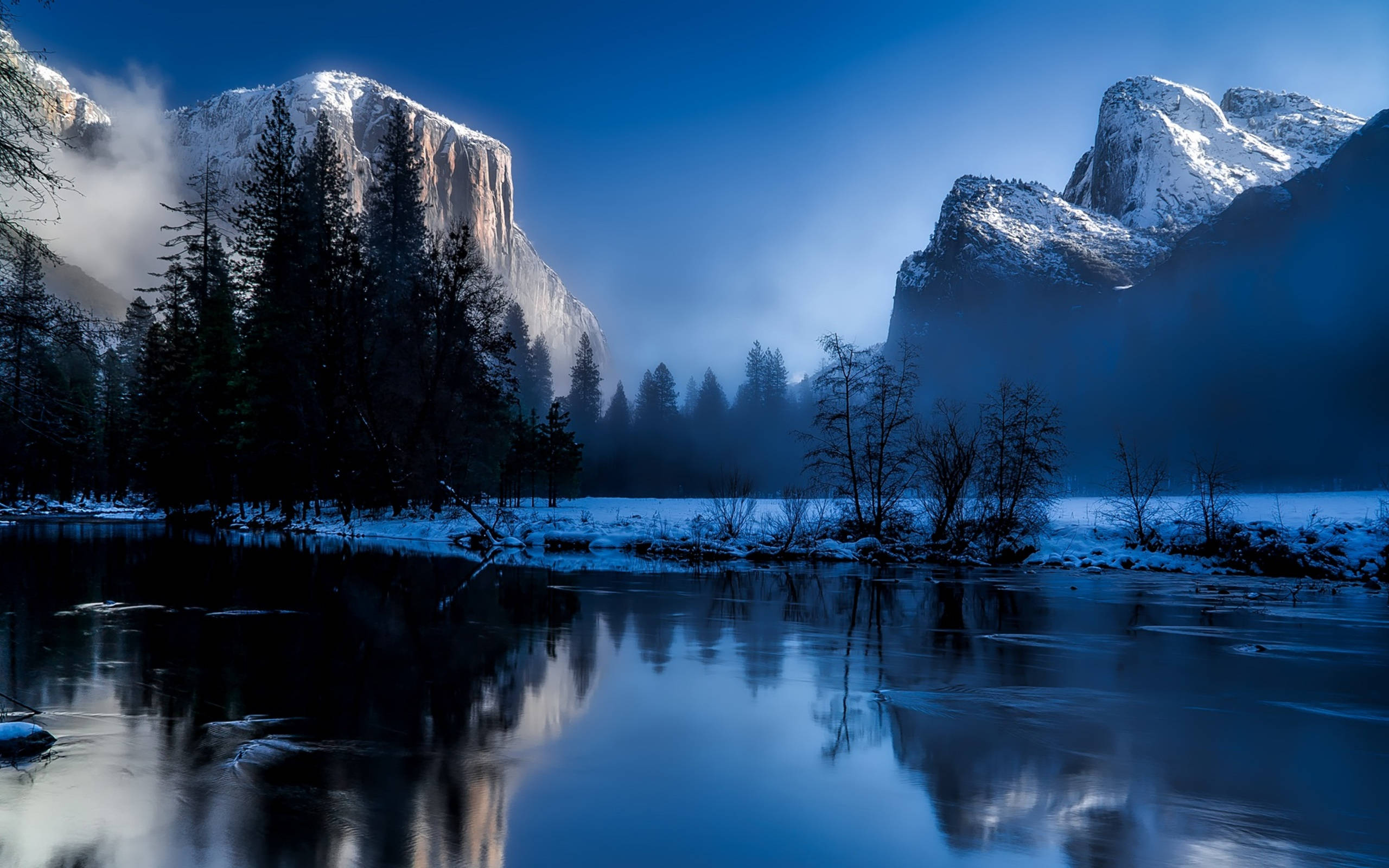 Yellowstone National Park, snowcapped mountains, misty forest, 2K Desktop Wallpaper