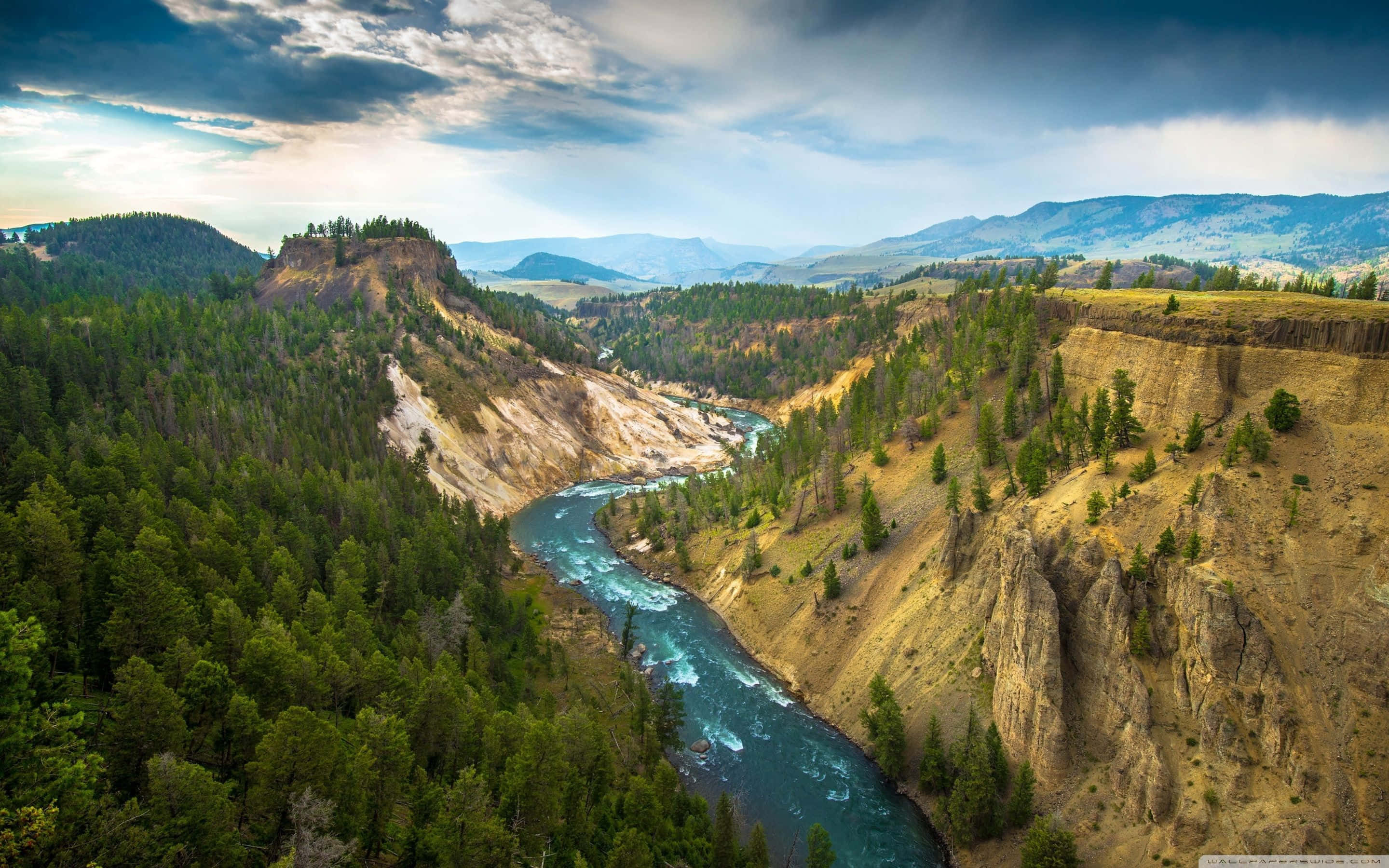 Yellowstone National Park, turquoise river, rugged canyon cliffs, 2K Desktop Wallpaper