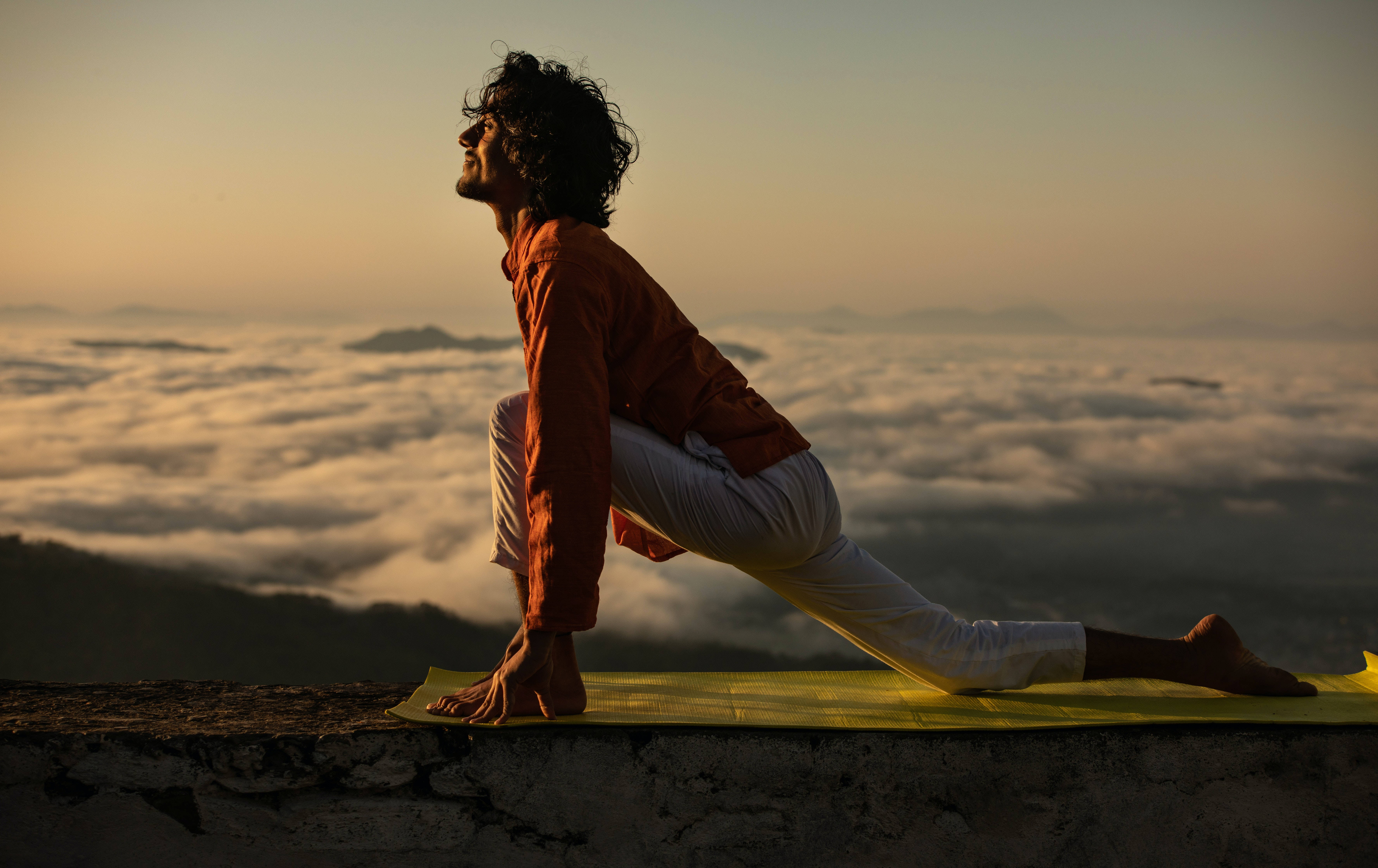 male pose yoga, mountain ledge, sea of clouds, 5K Desktop Wallpaper
