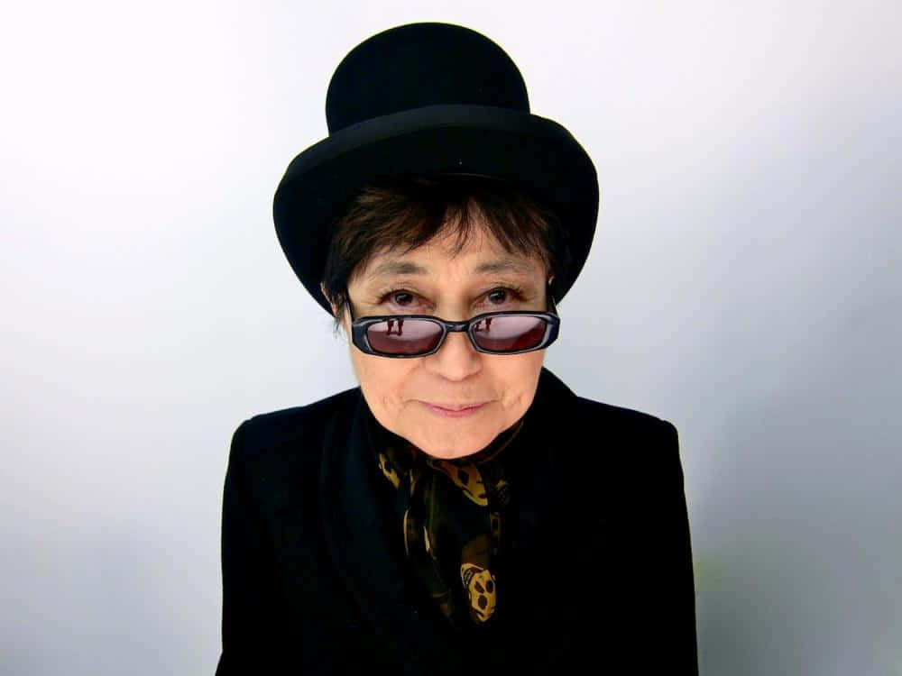 Yoko Ono, tall black hat, dark sunglasses, SD Desktop Wallpaper