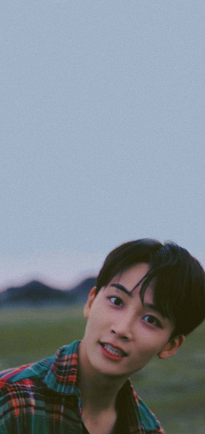Yoon Jeonghan, plaid shirt, dusky mountain backdrop, HD Phone Wallpaper