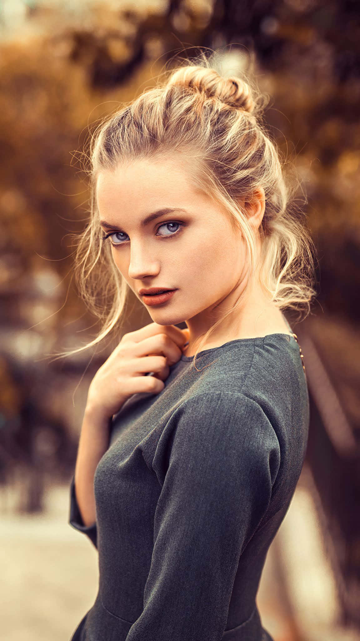 young female model, blonde hair, messy bun, Full HD Phone Wallpaper