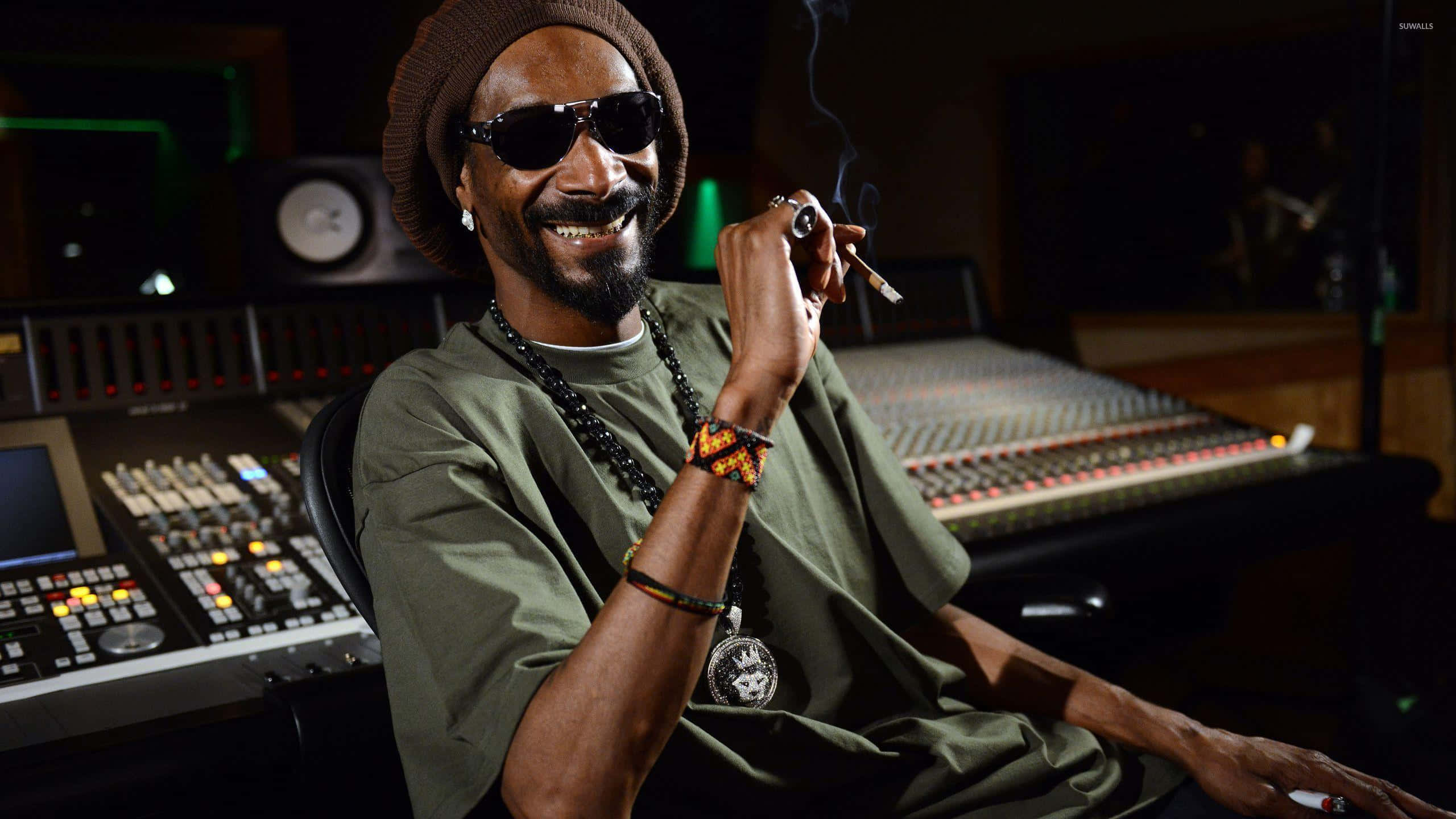 Snoop Dogg, lit cigarette, dimly lit recording studio, 2K Desktop Wallpaper