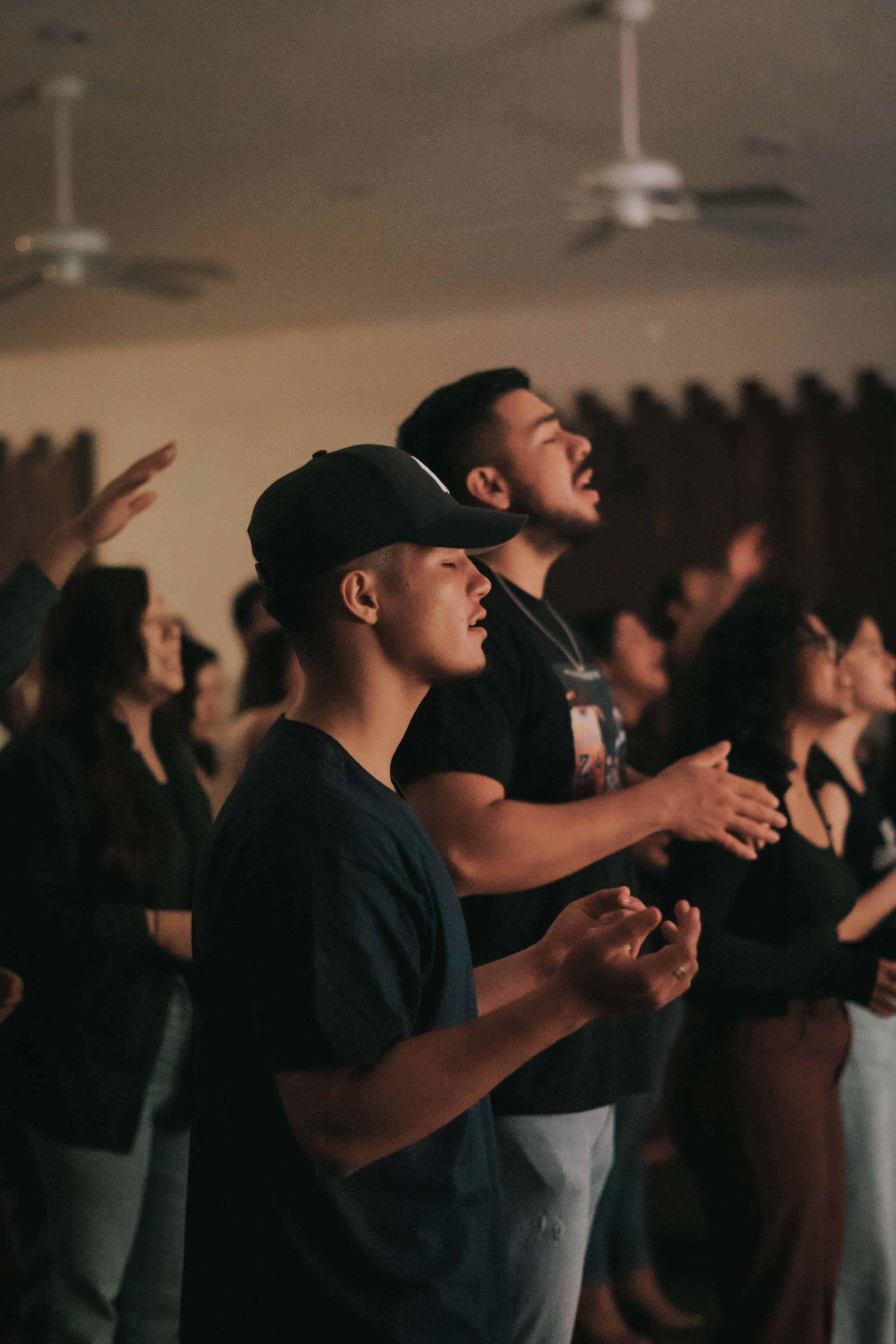 Youth Group, worship session, dimly lit room, 2K Phone Wallpaper