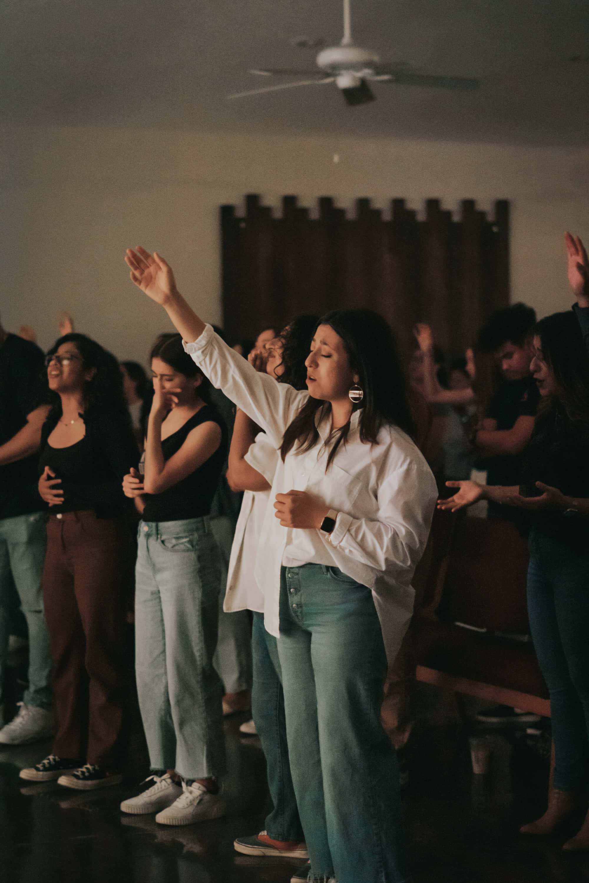 Youth Group, worship session, dimly lit room, 2K Phone Wallpaper