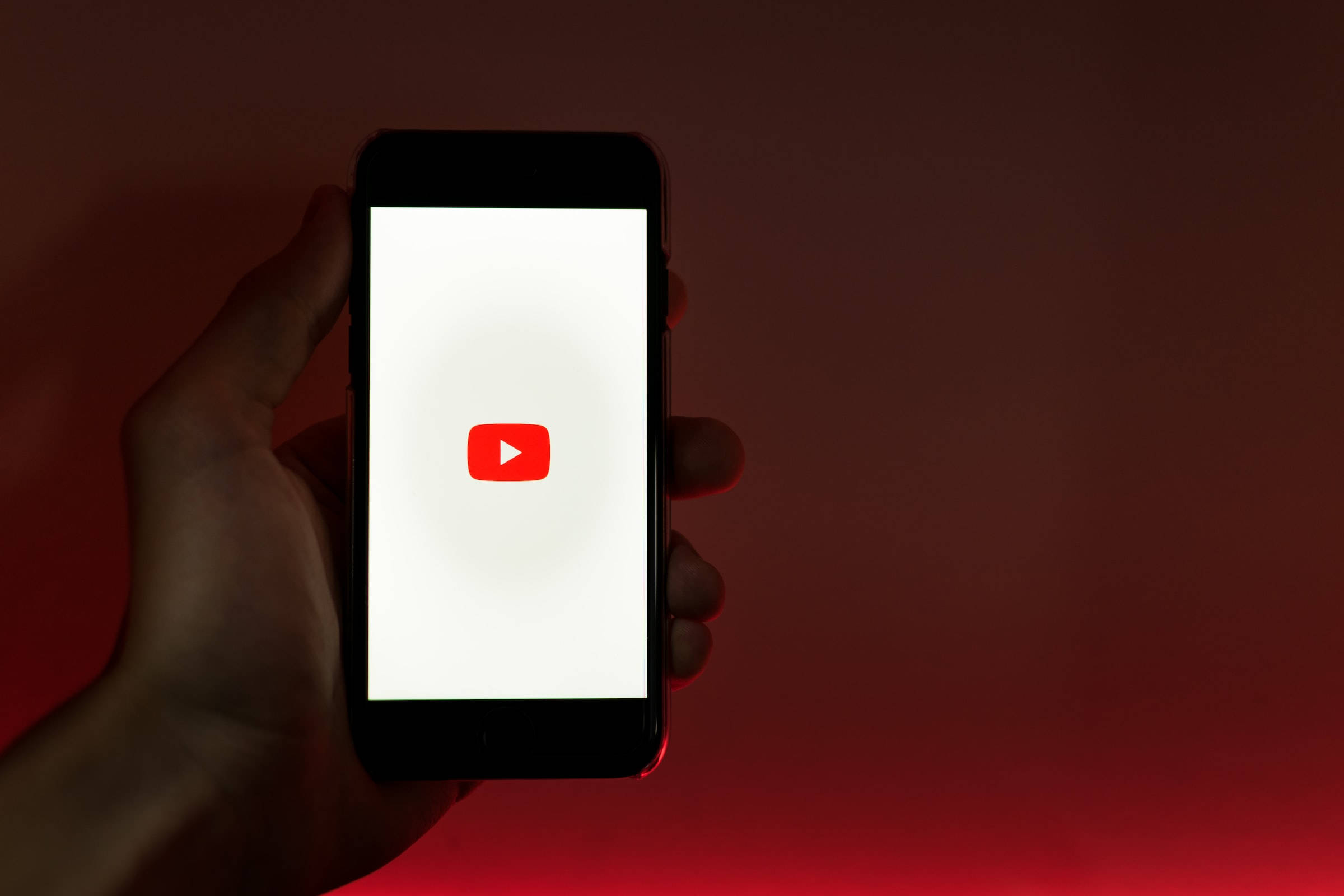 YouTube logo, smartphone, deep red gradient background, Full HD Desktop Wallpaper
