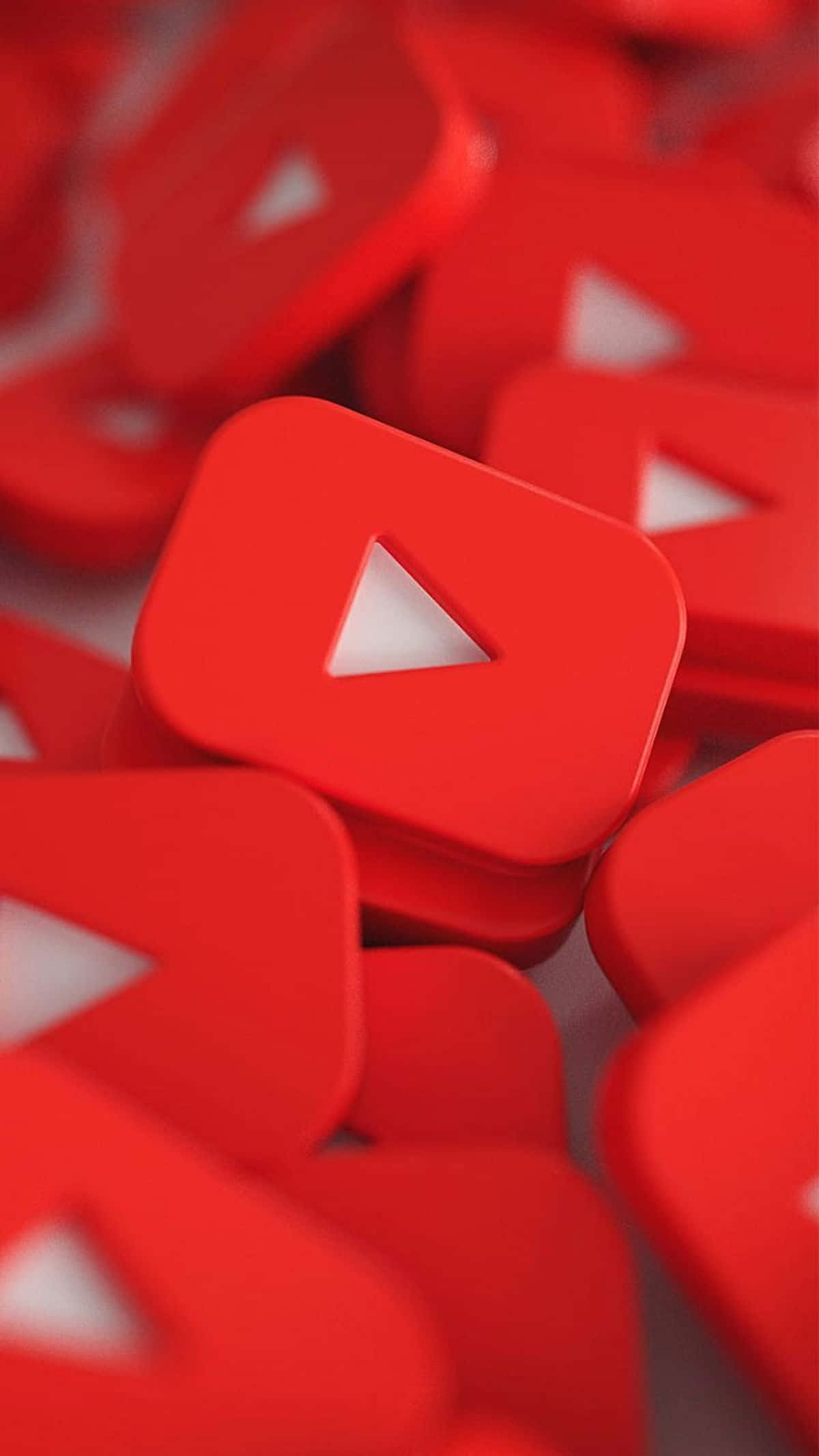 YouTube Gaming, glossy red YouTube play buttons, shallow depth of field, Full HD Phone Wallpaper