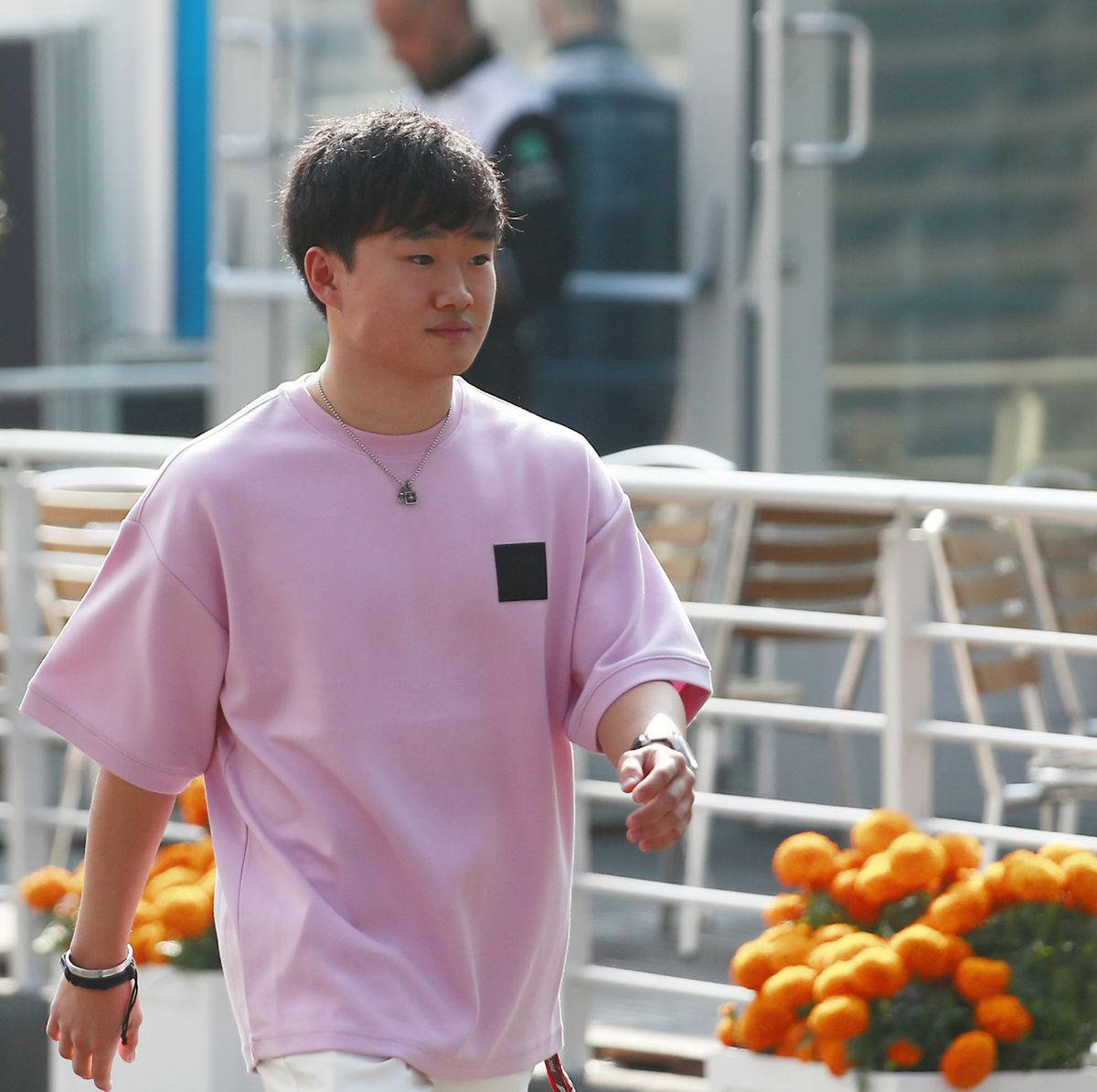 Yuki Tsunoda, pink polo shirt, vibrant orange flowers, SD Desktop Wallpaper
