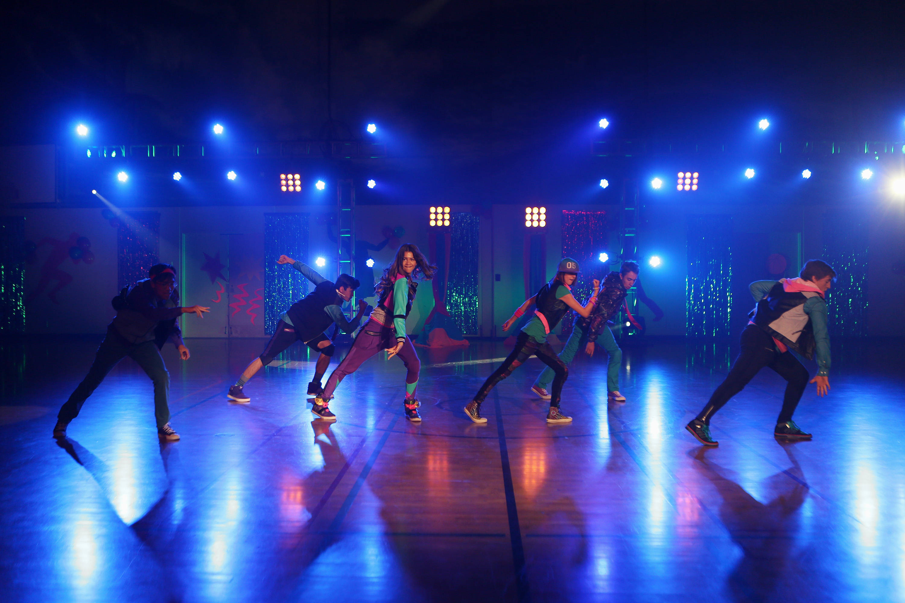 Zapped, dance off, vibrant blue stage lights, 2K Desktop Wallpaper