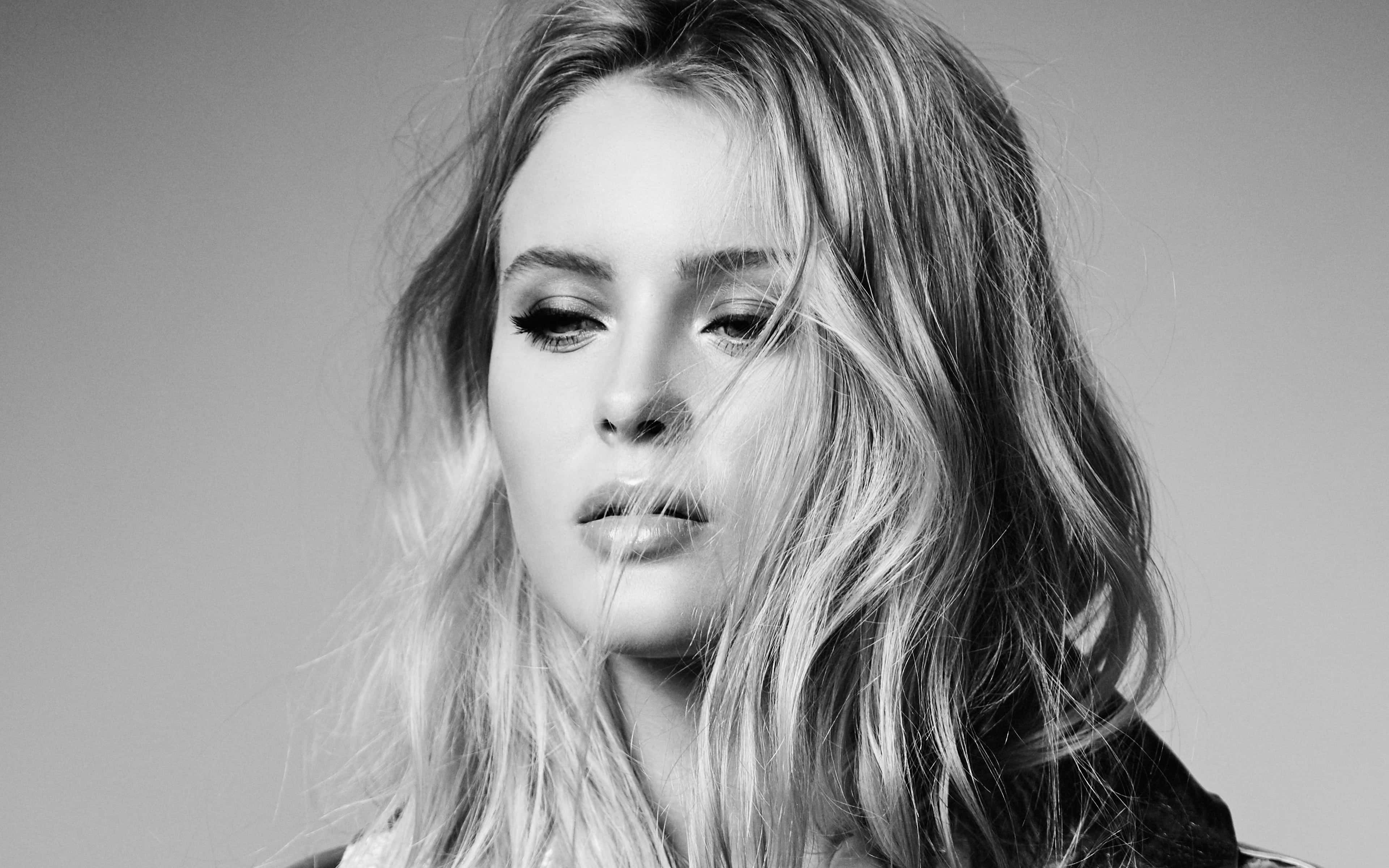 Zara Larsson, black and white portrait, tousled hair, 4K Desktop Wallpaper
