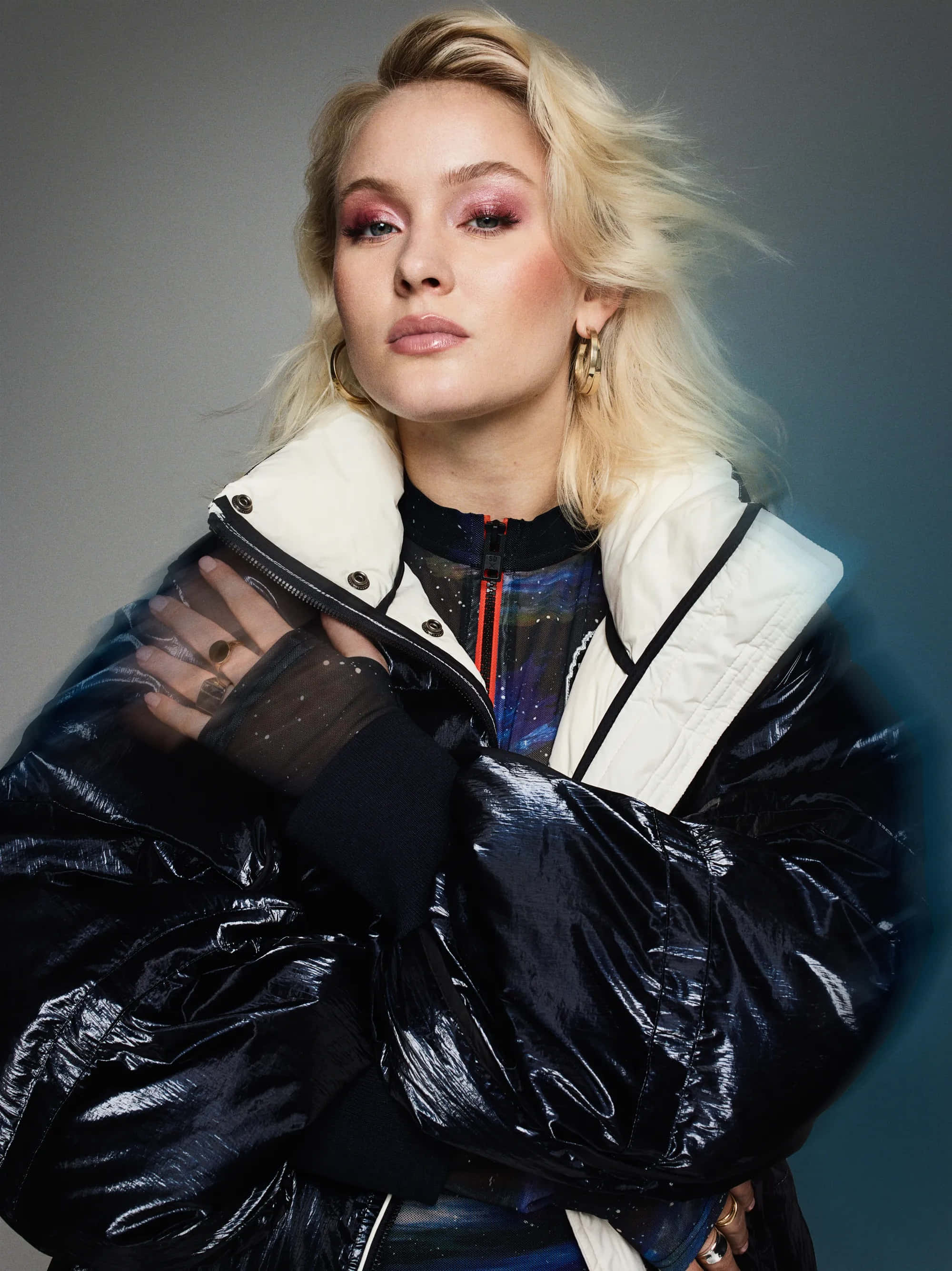 Zara Larsson, pink eyeshadow, shiny black and white puffer jacket, 2K Phone Wallpaper