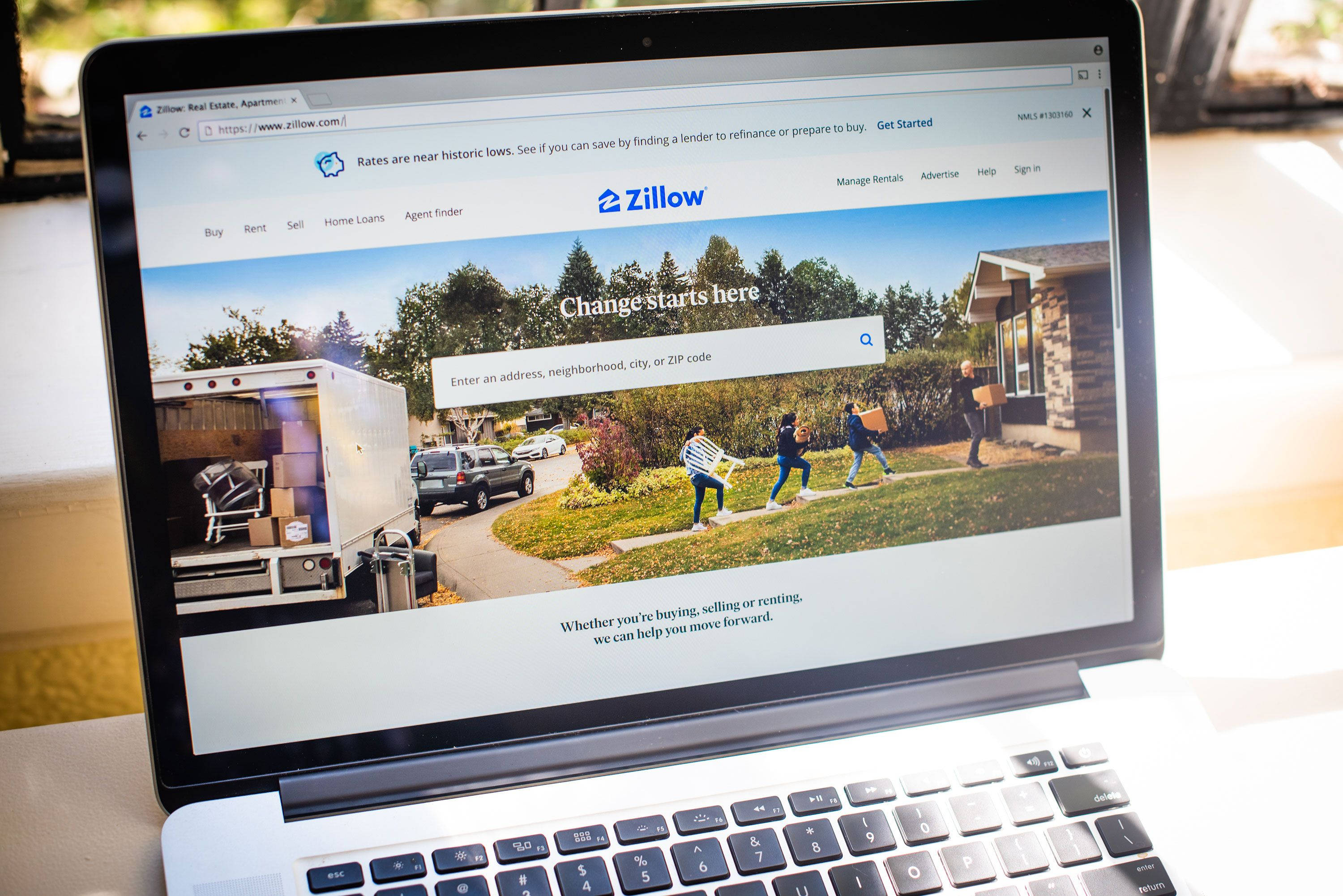 Zillow, laptop screen, real estate homepage, 2K Desktop Wallpaper