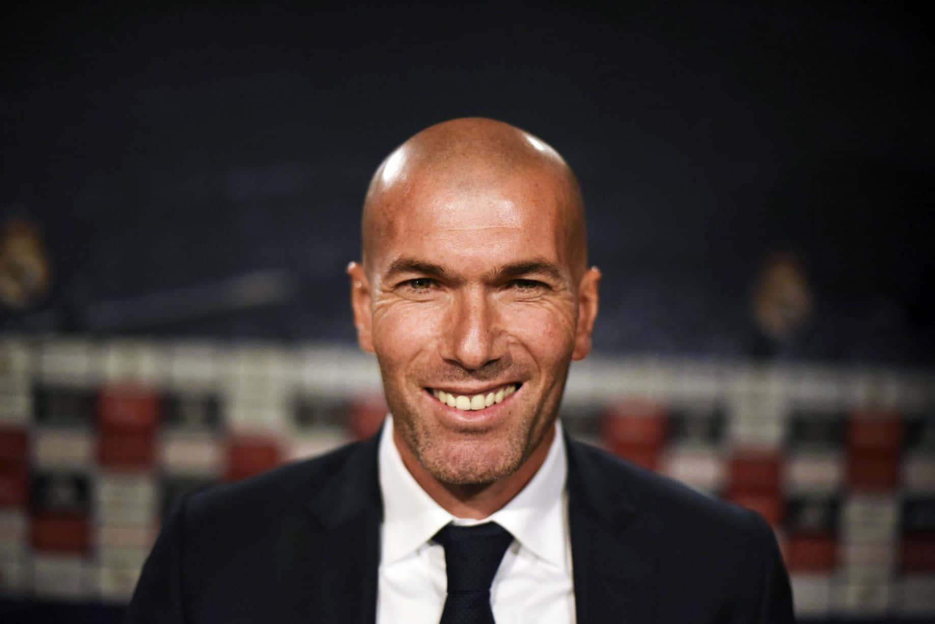 Zinedine Zidane, black suit, stadium backdrop, HD Desktop Wallpaper
