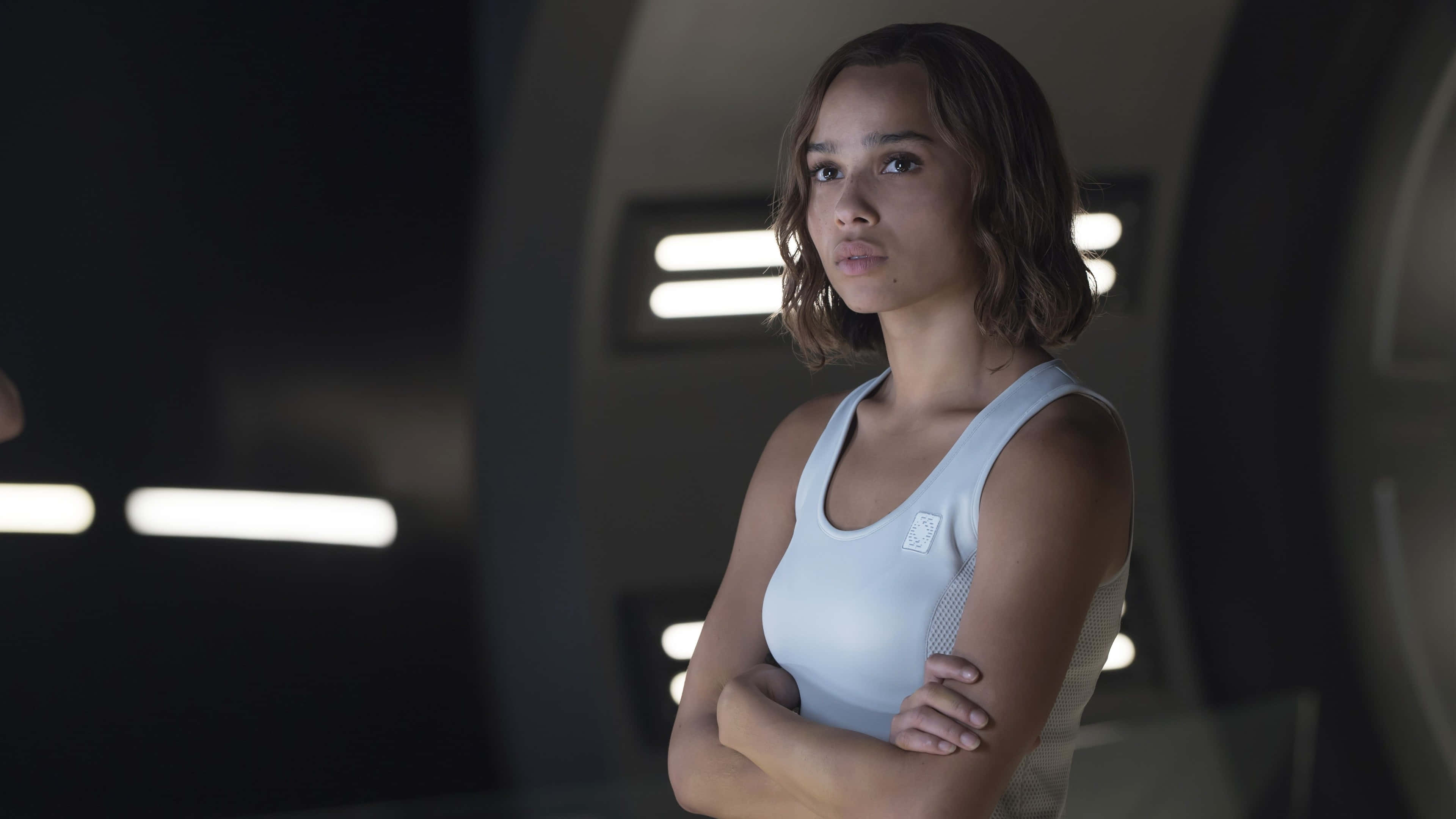 Zoë Kravitz, futuristic corridor, glowing horizontal lights, 4K Desktop Wallpaper