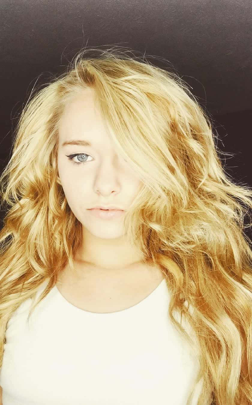 Zoe Laverne, long wavy blonde hair, striking blue eyes, HD Phone Wallpaper