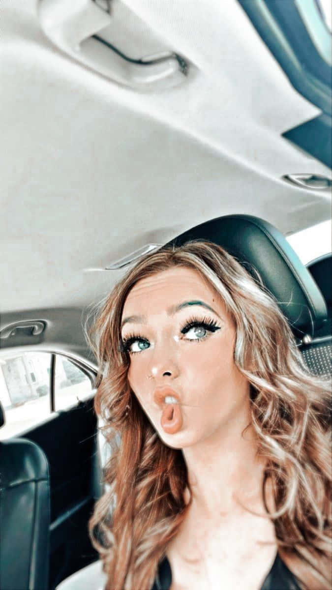 Zoe Laverne, car interior, long wavy hair, SD Phone Wallpaper