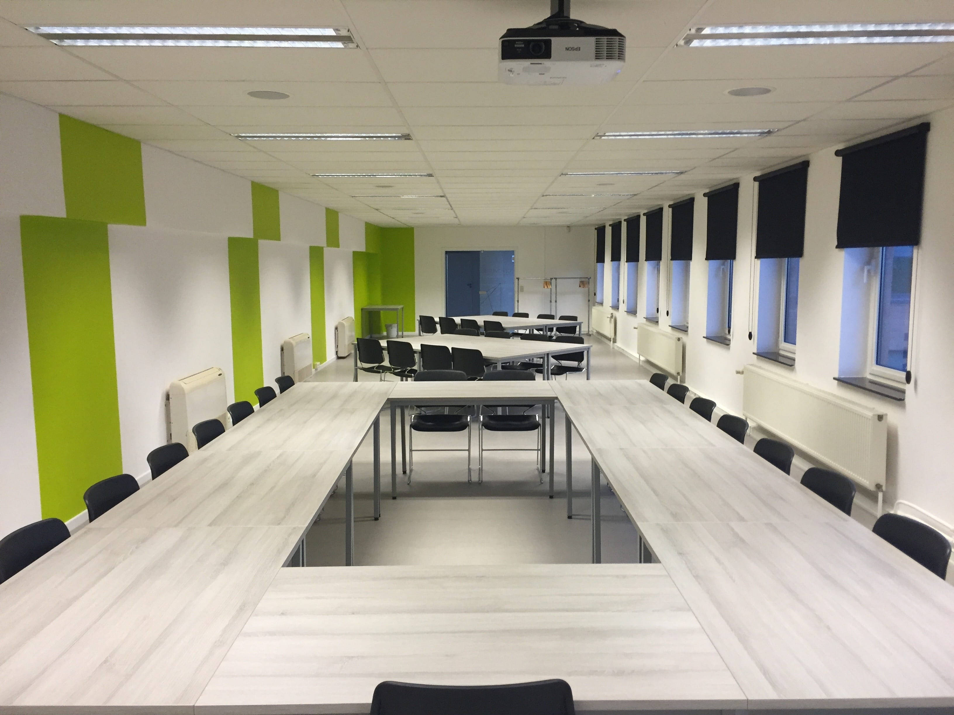 light wood tables, black chairs, lime green wall accents, 2K Desktop Wallpaper