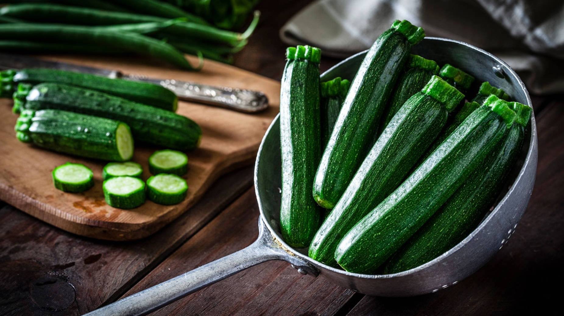 zucchini, metal colander, wooden cutting board, HD Desktop Wallpaper