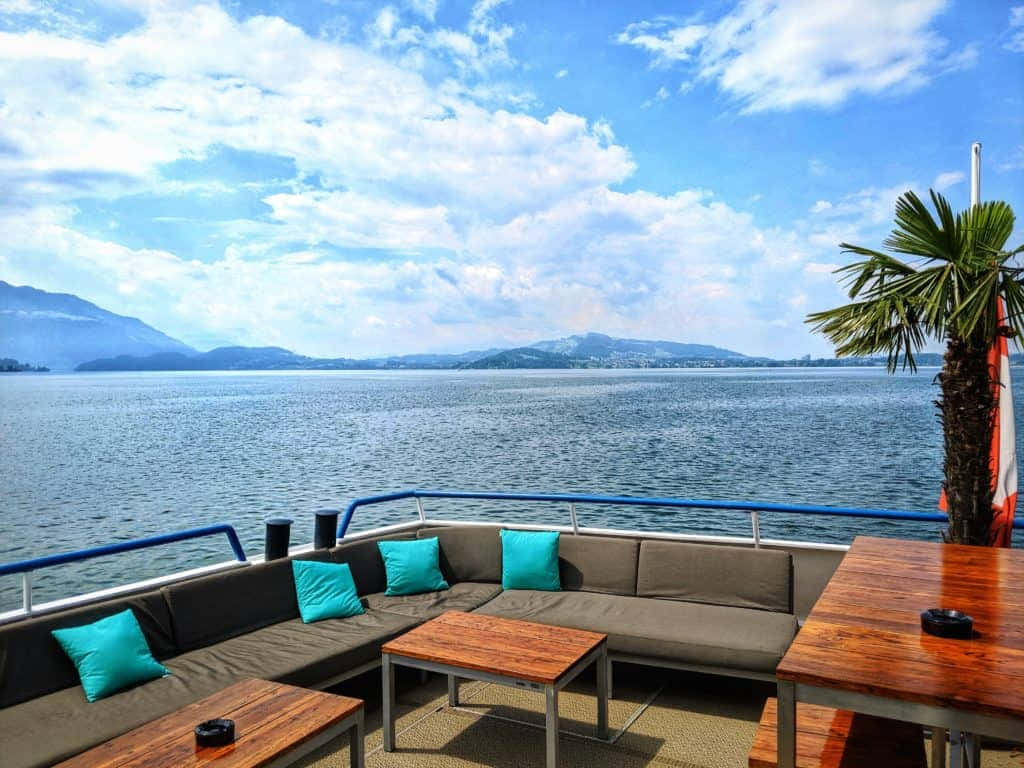 Lake Zug, teal pillows, vast blue lake, SD Desktop Wallpaper