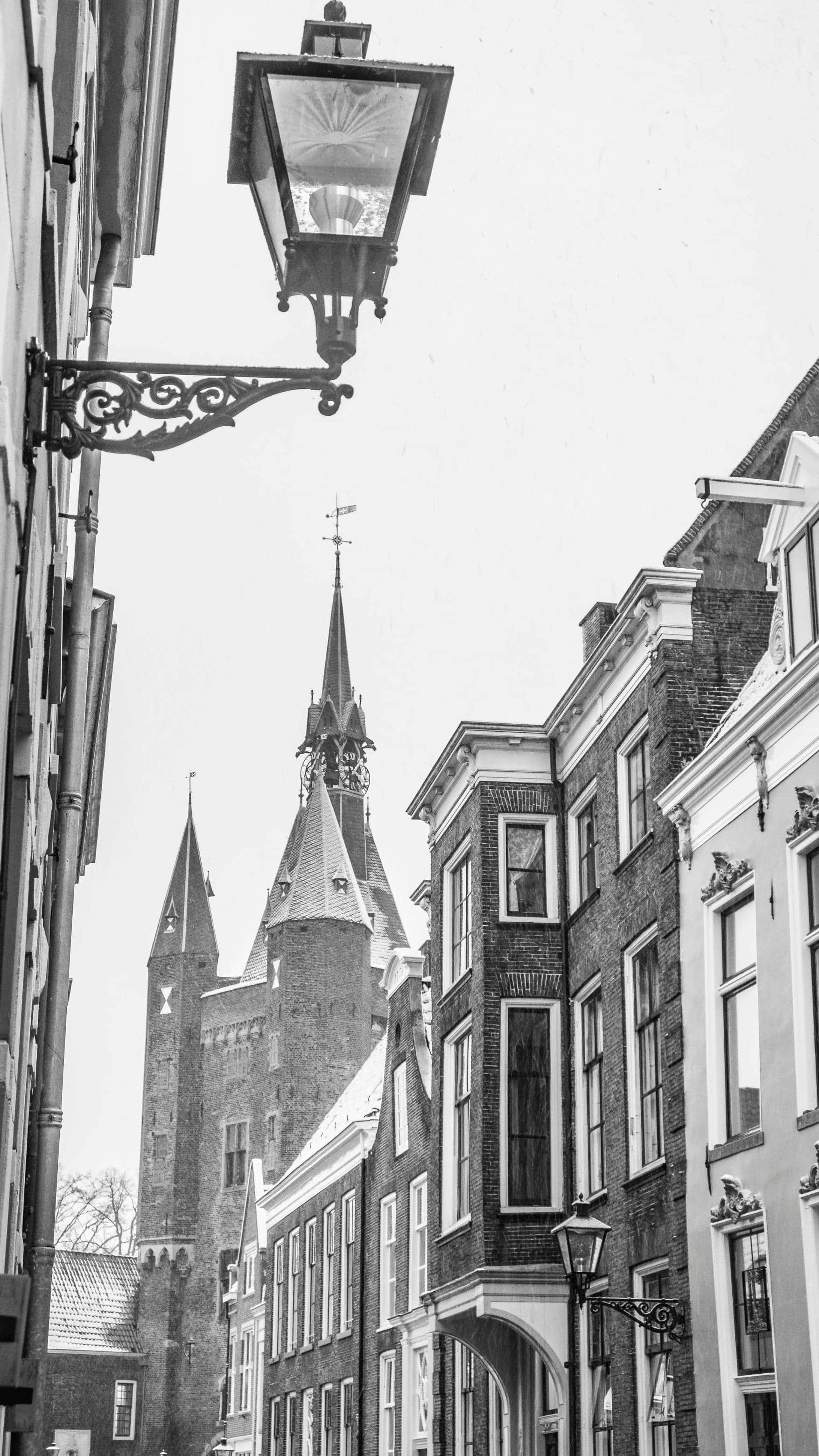 Zwolle, historic Dutch canal houses, ornate street lamps, 2K Phone Wallpaper