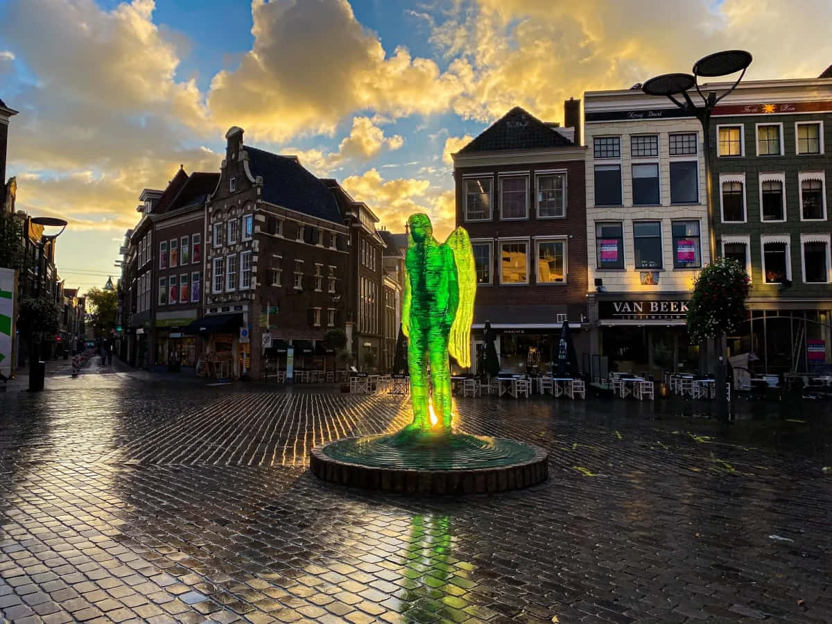 Zwolle, glowing green angel statue, dusk, SD Desktop Wallpaper